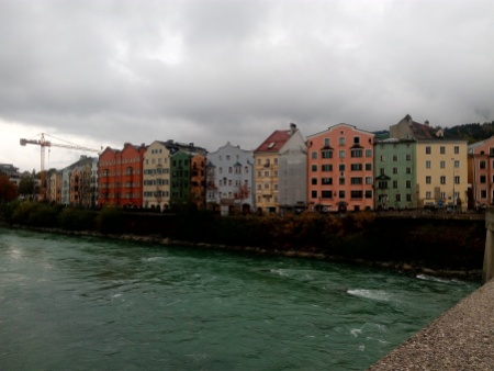 The iconic colourful houses of Innsbruck by the river Inn near Marktplatz.